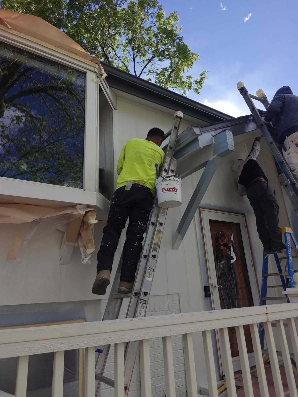 Modern white exterior home repaint near Lakewood, Colorado