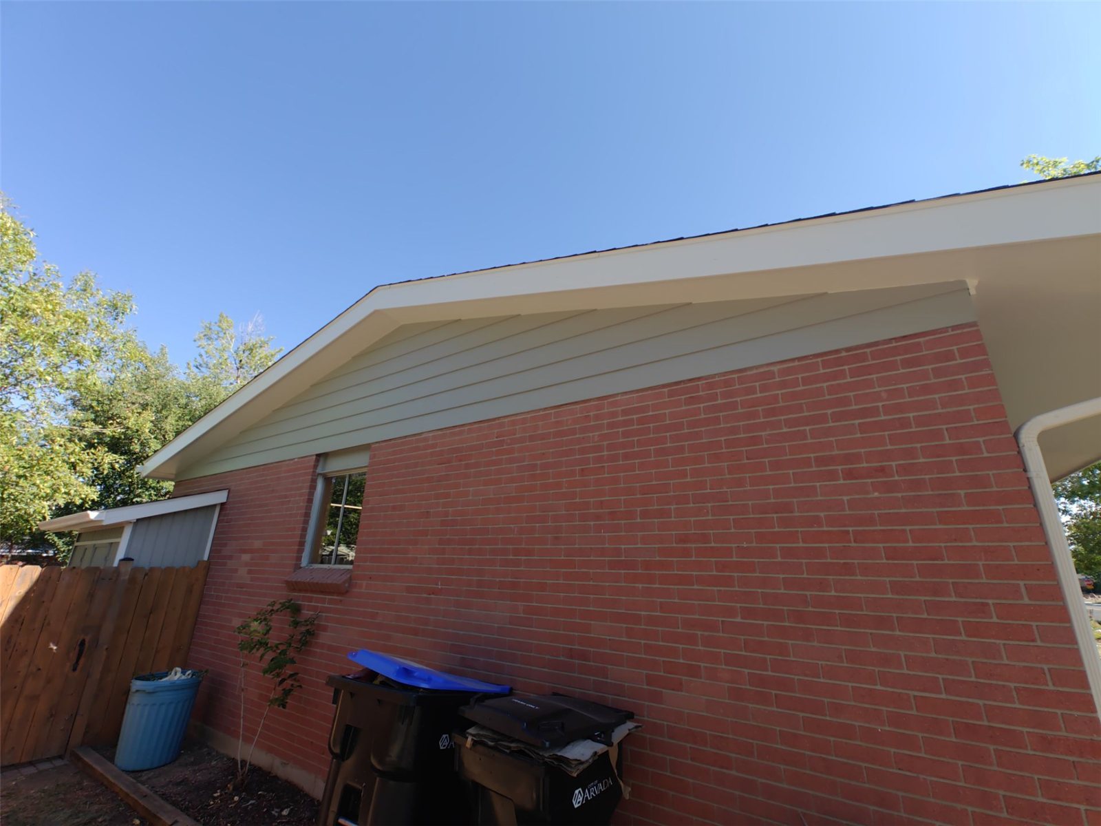 After: repainted rear siding of the Arvada home